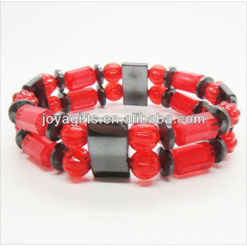 Fashion Magnetic stretch bracelet with red plastic beads